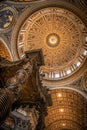St Peter`s dome by Michelangelo Buonarroti with Bernini`s baldacchino, Vatican city