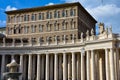St. Peter`s Square colonnades and fountain Royalty Free Stock Photo