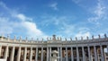 St. Peter`s Square with its statues in Vatican City, Europe. Large plaza located directly in front of St. Peter`s Basilica.