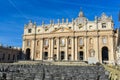 St Peter square basilica facade and chairas Royalty Free Stock Photo