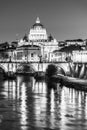 St Peters Basilica in Vatican and Ponte Sant`Angelo Bridge over Tiber River at dusk. Romantic evening cityscape of Rome Royalty Free Stock Photo