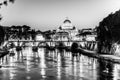 St Peters Basilica in Vatican and Ponte Sant`Angelo Bridge over Tiber River at dusk. Romantic evening cityscape of Rome Royalty Free Stock Photo