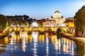 St Peters Basilica in Vatican and Ponte Sant`Angelo Bridge over Tiber River at dusk. Romantic evening cityscape of Rome Royalty Free Stock Photo