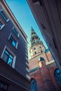 St Peters Church in old city Riga, Latvia. View from narrow street. Royalty Free Stock Photo