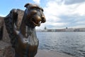 St. Petersburg. Bronze sculpture of a griffin against Neva