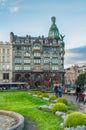 St Petersburg center, Russia. Zinger House on Nevsky Prospect and Kazan square with people walking along