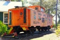 St Petersburg, Florida, U.S.A - February 16, 2021 - The orange train caboose at Heritage Village