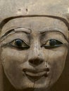 St. Petersburg, Russia - 01.16.2020: An ancient wooden pharaoh face. A fragment from a sarcophagus Royalty Free Stock Photo