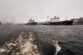 The Large Oceanic Icebreaker in the fairway of the river in the city center, surrounded by attractions on the neva river