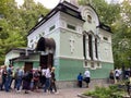 St. Petersburg, Russia, August 2021: The chapel over the grave of Blessed Xenia of St. Petersburg at Smolensk cemetery. A queue of