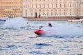 The man on the jet ski quickly floats on the Neva river on the b Royalty Free Stock Photo