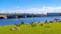 People sunbathe on lawn in St.Petersburg Royalty Free Stock Photo