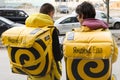 St. Petersburg, Russia - 04.14.19: Couriers of the food delivery service Yandex-food on the city street