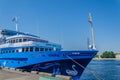 St. Petersburg, Russia - 07.16.2018: Cruise ship Swan Lake on the pier on a clear sunny day. River cruises are a great vacation Royalty Free Stock Photo