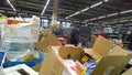 Empty shelves in the store. Bankruptcy of supermarket, largest retailer. Clutter, trash and scattered goods on dirty floor. Econo