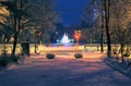 St. Petersburg, Russia - December 30, 2014: New Year sculpture in the park behind the roadway, night city landscape Royalty Free Stock Photo