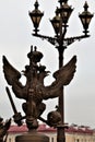 St. Petersburg, Russia, December 2019. Russian imperial double-headed eagle on a fence in the city center.