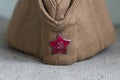 Soviet garrison cap with a red star with a hammer and sickle Royalty Free Stock Photo