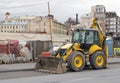 St. Petersburg, Russia - February 23, 2020. Bulldozer on the demolition of an old house