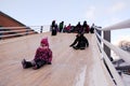 Children skate with a specially wrapped up hill
