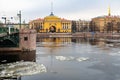 St. Petersburg, Russia, February 2020. A fragment of the bridge and a view of the Admiralty tower. Royalty Free Stock Photo