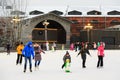St. Petersburg, Russia -February 11, 2017: Ice skating rink in city at winter. People learning to skate. New Holland Island.
