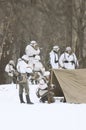 The troop of German soldiers of the Wehrmacht in winter camouflage