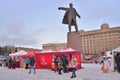 Tea tents under a monument to Vladimir Lenin during the carnival Royalty Free Stock Photo