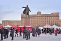 Tea tents under a monument to Vladimir Lenin during the carnival Royalty Free Stock Photo