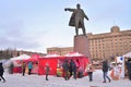 Tea tents under a monument to Vladimir Lenin during the carnival Royalty Free Stock Photo