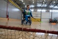 Young female sportswomen in wheelchairs prepare for competitions in the gym