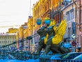 Griffins on Bank Bridge in front of Saint Petersburg State University Royalty Free Stock Photo