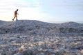 Tourists stroll along the coast of the Gulf of Finland. Sunny, fine day after a hurricane and an ice storm