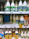 Varieties Milk, yoghurt, kefir on supermarket shelves. Natural dairy products. Fresh Yogurt. Food price. Retail industry. Rack.