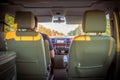 St. Petersburg, Russia - July 22, 2019: Interior of modern Volkswagen Multivan California Ocean Transporter T6. Man drives a car