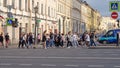 St.Petersburg,Russia-July 10, 2022: People crowd cross a pedestrian crossing