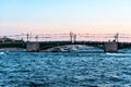 St. Petersburg, Russia, July 2018. View of the Palace Bridge from the surface of the Neva River.