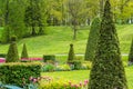 St. Petersburg, Russia - June 3 2017. Flower parterre in front of large cascade fountain Royalty Free Stock Photo