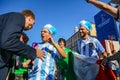 St. Petersburg, Russia - June 26, 2018: Journalist interviewing sport fans of Argentina football team.