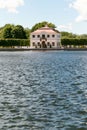 St. Petersburg, Russia - June 28, 2017: A lonely building by the water. Peterhof in St. Petersburg Royalty Free Stock Photo