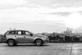 A modern luxury swedish car Volvo XC60 R-Design Polestar Edition on the roof of the building. Black and white Royalty Free Stock Photo