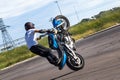 St. Petersburg, Russia - June 2019: moto rider making doing a difficult and dangerous stunt on his motorbike