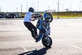 St. Petersburg, Russia - June 2019: moto rider making doing a difficult and dangerous stunt on his motorbike