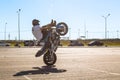 St. Petersburg, Russia - June 2019: moto rider making doing a difficult and dangerous stunt on his motorbike