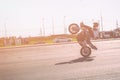 St. Petersburg, Russia - June 2019: moto rider making doing a difficult and dangerous stunt on his motorbike