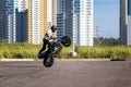 St. Petersburg, Russia - June 2019: moto rider making doing a difficult and dangerous stunt on his motorbike