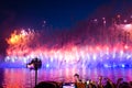 ST. PETERSBURG, RUSSIA - JUNE, 2018: People making photos of fireworks over Neva river at alumni celebration Scarlet sails