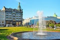 A fountain on Nevsky Prospect on the background of the singer Ho