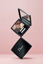 Eye shadow palette Dior 5 couleurs couture on pink background. Christian Dior