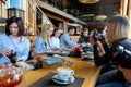 St. Petersburg, Russia-March 24, 2019. A group of four business people gathered at the Breakfast table, discussing an interesting Royalty Free Stock Photo